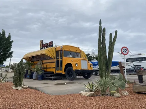 The yellow bus at the marina